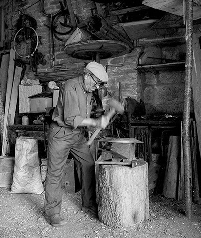 an Italian man in a workshop